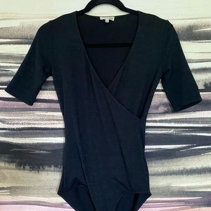 Gently used black stretchy Wilfred body suit.